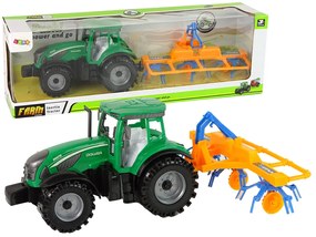 Lean Toys Zelený traktor s hrabľami na seno – trecí pohon