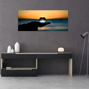 Obraz sklenenej gule v dlani (120x50 cm)