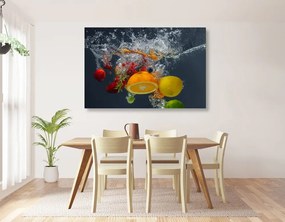 Obraz padajúce ovocie do vody