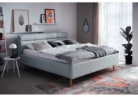 Modrá čalúnená dvojlôžková posteľ s úložným priestorom s roštom 180x200 cm Lotte - Meise Möbel
