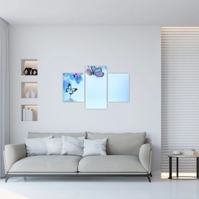 Obraz - Motýľ na kvetoch orchidey, modrý (90x60 cm)