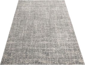 Kvalitný sivý koberec v módnom designe