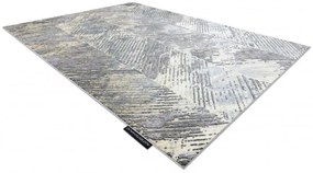 Koberec DE LUXE 2087 Jodelka Chevron vintage - zlatý / sivý