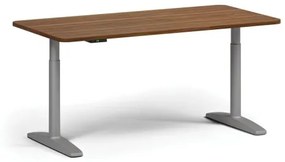 Výškovo nastaviteľný stôl OBOL, elektrický, 675-1325 mm, zaoblené rohy, doska 1600x800 mm, sivá zaoblená podnož, orech