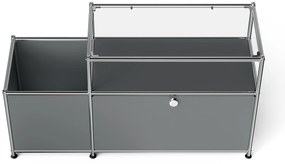 Kovová nízka skrinka »CN3« s výklopným priečinkom a sklenenou doskou, sivá