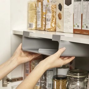 Sivý závesný plastový držiak na fólie a papierové utierky CupboardStore – Joseph Joseph