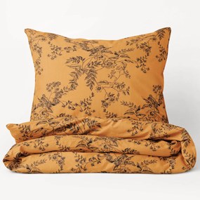 Goldea bavlnené posteľné obliečky - čierne kvety na tmavo oranžovom 140 x 220 a 70 x 90 cm