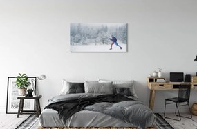 Obraz na skle Les v zime sneh muž 120x60 cm