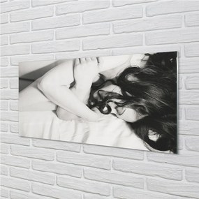 Obraz na skle spiace ženu 140x70 cm