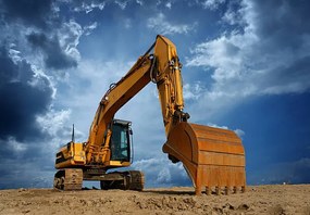 Ilustrácia Yellow Excavator at Construction Site, narvikk