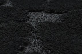 Kúpeľňový koberček SUPREME STONES kamienky, čierny kruh
