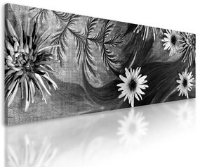 Obraz nádherné kvety s tajomným pozadím v čiernobielom prevedení