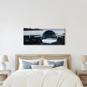 Obraz sklenené gule na skale (120x50 cm)