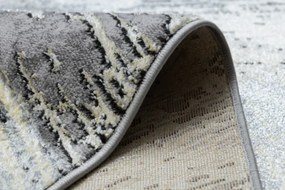 Koberec DE LUXE 2087 Jodelka Chevron vintage - zlatý / sivý