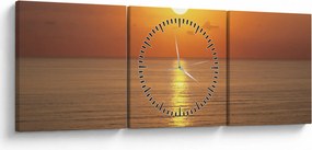 Obraz - Západ slnka nad oceánom (s hodinami) (90x30 cm)