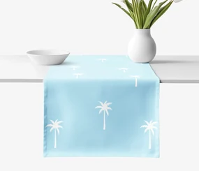 Goldea behúň na stôl 100% bavlnené plátno - palmy na pastelovo modrej 50x120 cm