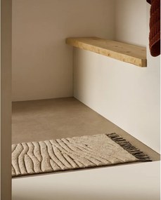 Béžová kúpeľňová predložka 50x70 cm Crilda – Kave Home