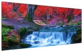 Obraz vodopádu v červenom lese (120x50 cm)