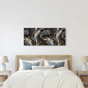 Obraz - Tropické listy v čierno-zlatej (120x50 cm)