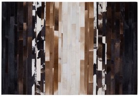 Kožený koberec 140 x 200 cm čierna/béžová DALYAN Beliani