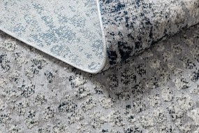 Moderný koberec REBEC 51117 strapce,  krémovo/ tmavo modrý