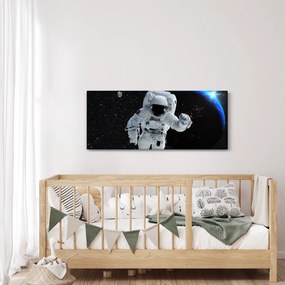 Obraz - Astronaut vo vesmíre (120x50 cm)