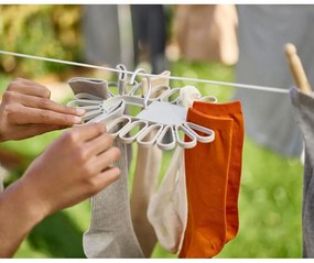 Béžový závesný sušiak na bielizeň Petal – Joseph Joseph