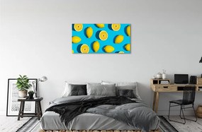 Obraz canvas Citróny na modrom pozadí 125x50 cm
