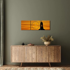 Obraz kostola pri západe slnka (s hodinami) (90x30 cm)