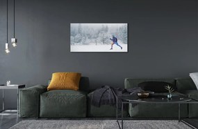 Obraz na skle Les v zime sneh muž 140x70 cm
