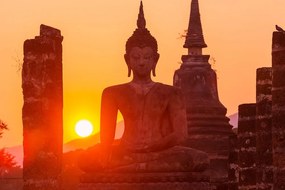 Fototapeta socha Budhu pri východe slnka