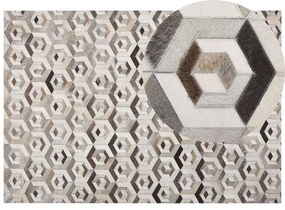 Kožený koberec 160 x 230 cm hnedá/béžová TAVAK Beliani