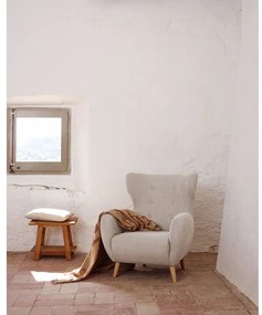 Béžové kreslo ušiak Patio – Kave Home