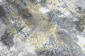 Moderný koberec DE LUXE 6754 ornament vintage - Štrukturálny krém / zlatý