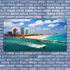 Obraz na akrylátovom skle More pláž mesto krajina 120x60 cm