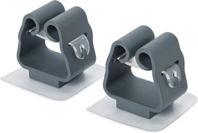 Samolepiaci držiak na metlu