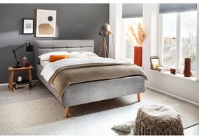 Sivá čalúnená dvojlôžková posteľ s úložným priestorom s roštom 140x200 cm Lotte – Meise Möbel