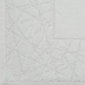Dekorstudio Bavlnený kúpeľňový koberček NIKA s geometrickým vzorom - biely