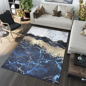 Modrý trendový koberec s abstraktným vzorom Šírka: 140 cm | Dĺžka: 200 cm
