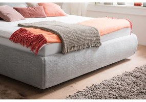 Sivá čalúnená dvojlôžková posteľ s úložným priestorom s roštom 180x200 cm Atesio – Meise Möbel