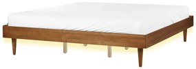 Drevená posteľ s LED 180 x 200 cm svetlé drevo TOUCY Beliani