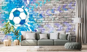 Tapeta modrá futbalová lopta na tehlovej stene - 375x250