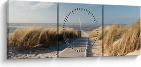 Obraz - Piesočná pláž na ostrove Langeoog, Nemecko (s hodinami) (90x30 cm)
