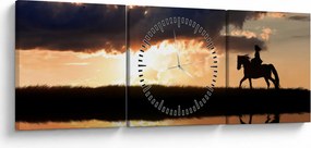 Obraz - Jazdec na koni pri západe slnka (s hodinami) (90x30 cm)