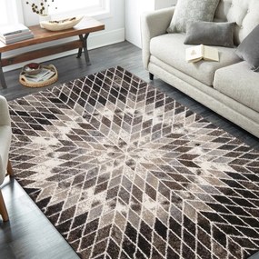 Hnedý vzorovaný koberec a abstraktným motívom Šírka: 120 cm | Dĺžka: 170 cm