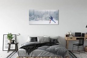 Obraz plexi Les v zime sneh muž 125x50 cm