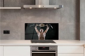 Sklenený obklad do kuchyne muž remeň 140x70 cm