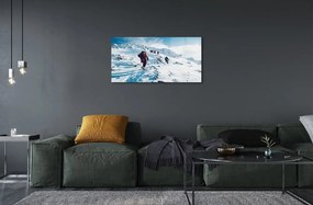 Obraz na skle Lezenie na hory v zime 100x50 cm