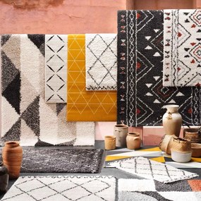 Béžový koberec s prímesou bavlny 68x110 cm Modesto – douceur d'intérieur