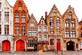 Fotografia Medieval houses standing in a row, Bruges, Belgium, Alexander Spatari